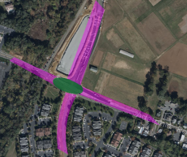 In the image is the second intersection design for the Halls Mill Road and Adelphia Road intersection.  The new road geometry is shown in purple.