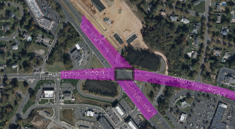 In the image the second intersection for US-9 Adelphia Road, shown in purple.  This is a signilized intersection without the original jughandles.